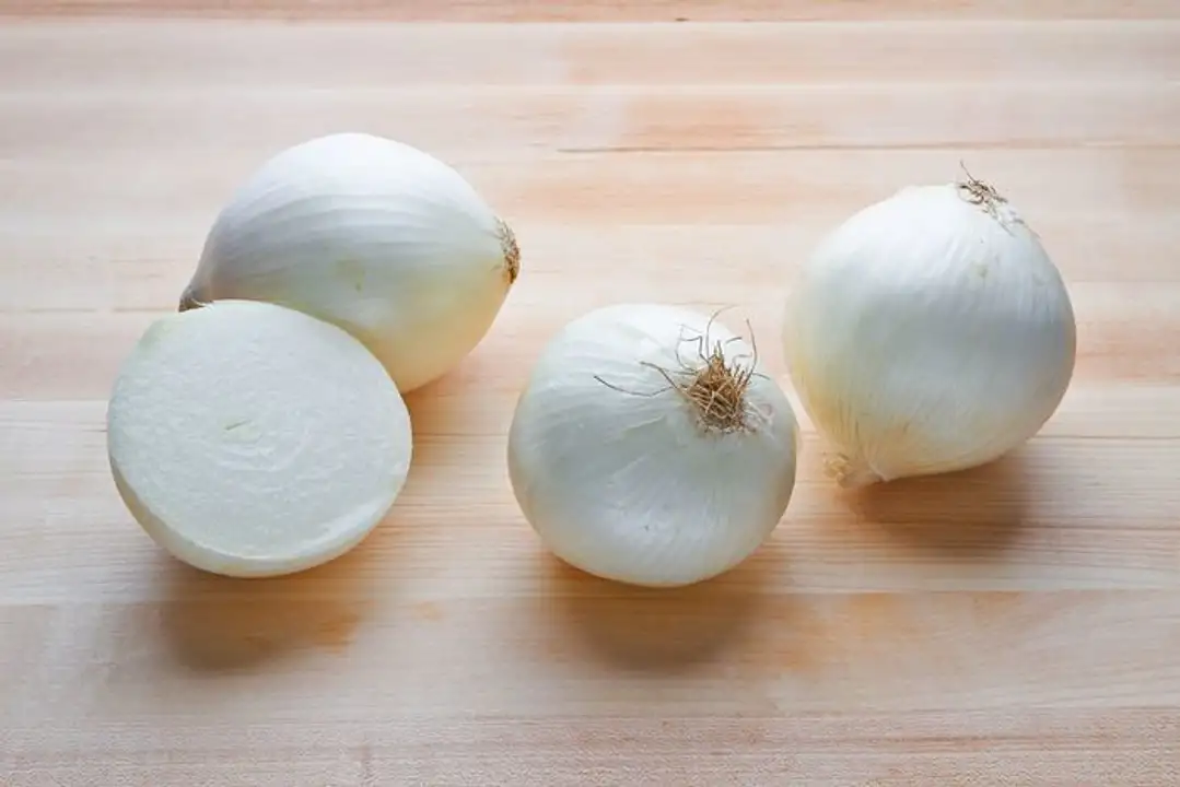 Order White Onion food online from Fligner Market store, Lorain on bringmethat.com