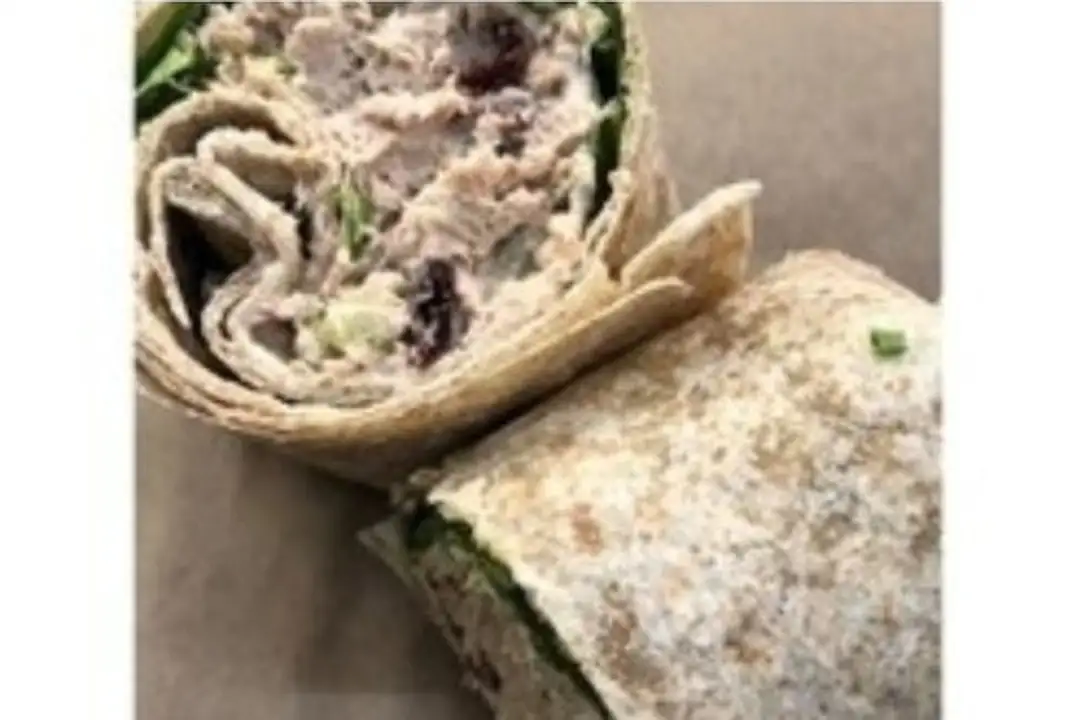 Order WFC Deli Cranberry Tuna Wrap food online from Whole Foods Co-Op Denfeld store, Duluth on bringmethat.com
