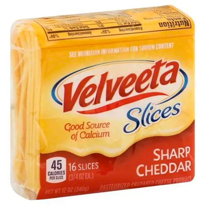 Order Velveeta Slices Cheese Product, Pasteurized Prepared, Sharp Cheddar - 12 Ounces food online from Fligner Market store, Lorain on bringmethat.com