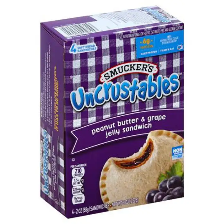 Order Smuckers Uncrustables Sandwich, Peanut Butter & Grape Jelly - 8 Ounces food online from Holiday farms store, Roslyn Heights on bringmethat.com