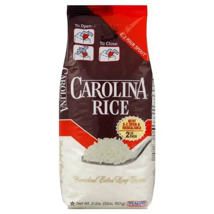 Order Carolina Rice, Enriched Extra Long Grain - 32 Ounces food online from Meats Supreme store, Brooklyn on bringmethat.com