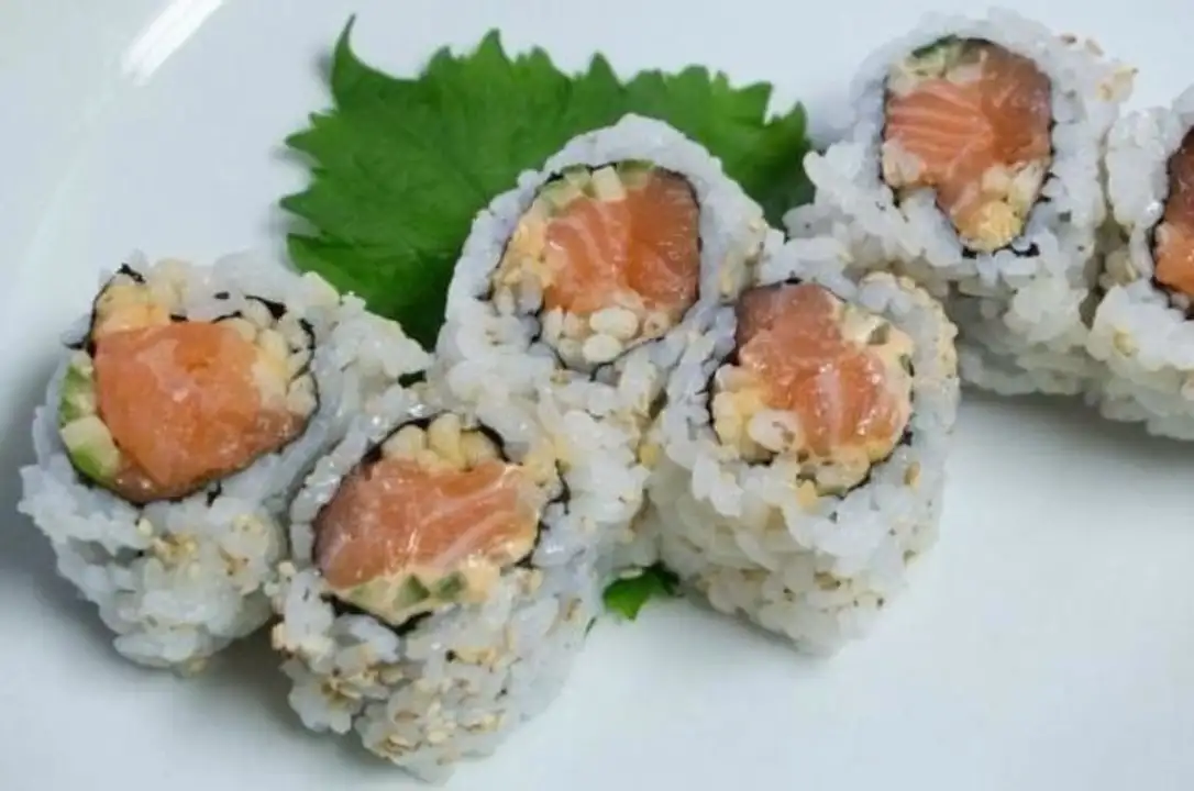 Order Spicy Salmon Roll food online from Holiday farms store, Roslyn Heights on bringmethat.com