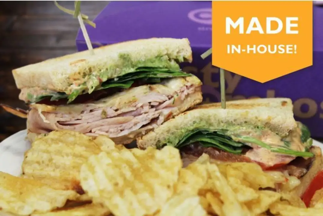 Order WFC Deli Turkey & Cheddar on Wheat food online from Whole Foods Co-Op Denfeld store, Duluth on bringmethat.com