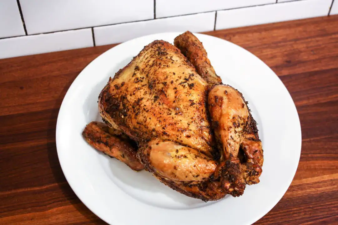 Order Herb Rubbed Rotisserie Chicken, Cooked (Hot) food online from Meats Supreme store, Brooklyn on bringmethat.com
