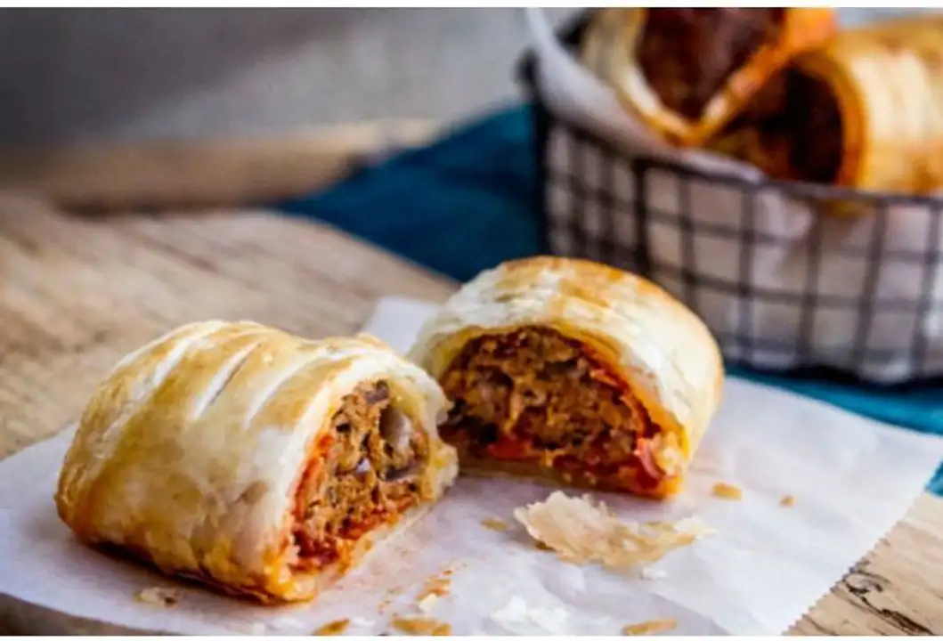 Order Sausage & Pepper Roll food online from Meats Supreme store, Brooklyn on bringmethat.com