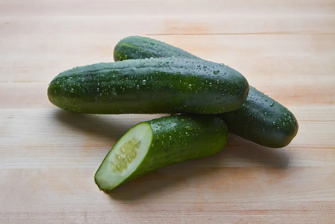 Order Green Cucumber - 1 Count food online from Holiday farms store, Roslyn Heights on bringmethat.com