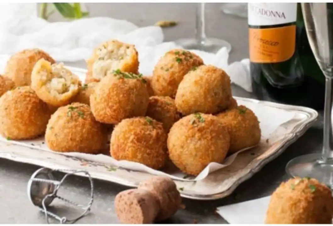 Order Mini Cheese Rice Balls food online from Meats Supreme store, Brooklyn on bringmethat.com