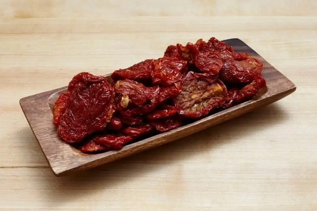 Order Sun Dried Tomatoes - 1 Ounce food online from Holiday farms store, Roslyn Heights on bringmethat.com