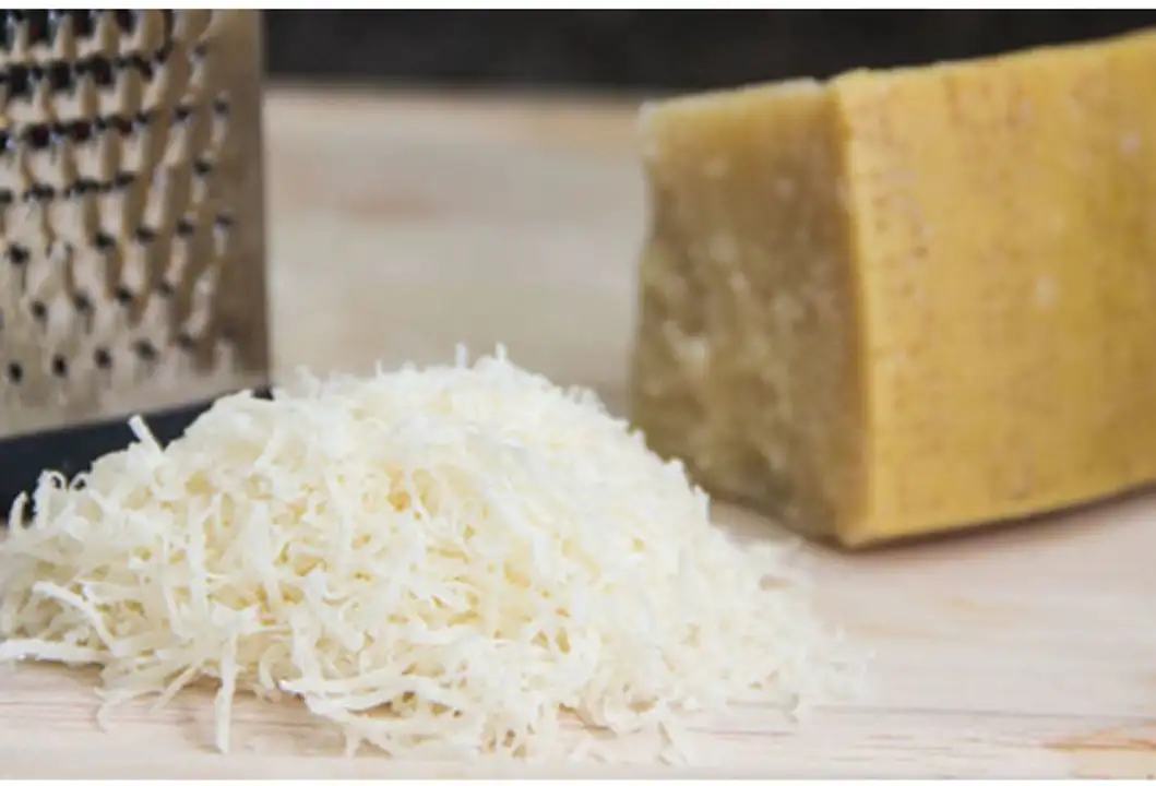Order Fresh Grated Reggiano Parmigiano Cheese food online from Meats Supreme store, Brooklyn on bringmethat.com