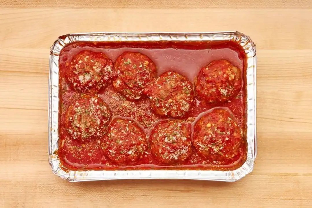 Order Meatballs in Sauce - Half Tray food online from Meats Supreme store, Brooklyn on bringmethat.com