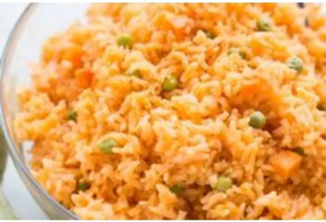 Order Spanish Rice - Half Tray food online from Meats Supreme store, Brooklyn on bringmethat.com