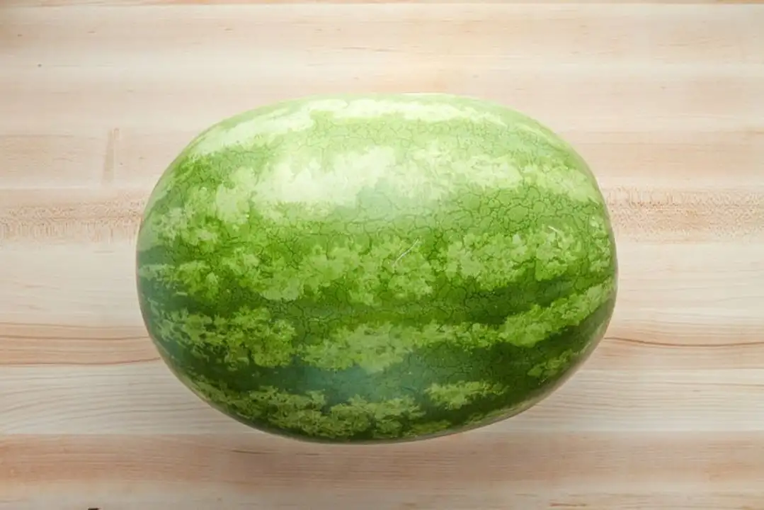 Order Produce Watermelon, Seedless, Mini - 1 Each food online from Holiday farms store, Roslyn Heights on bringmethat.com