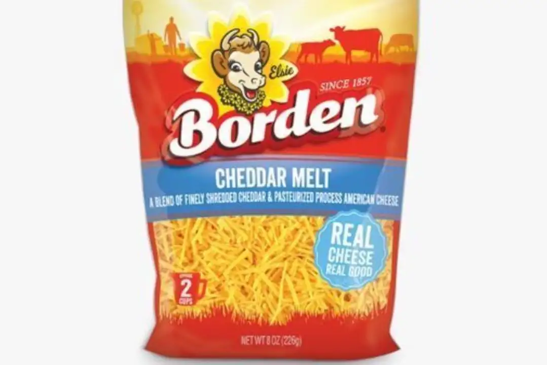 Order Borden Fine Shredded Cheddar Melt Cheese - 8 Ounces food online from Fligner Market store, Lorain on bringmethat.com