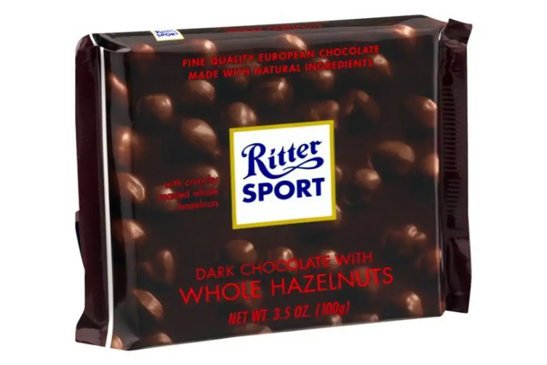 Order Ritter Sport Dark Chocolate, with Whole Hazelnuts - 3.5 Ounces food online from Holiday farms store, Roslyn Heights on bringmethat.com