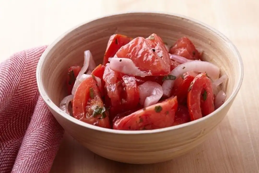 Order Tomato Onion Salad food online from Holiday farms store, Roslyn Heights on bringmethat.com