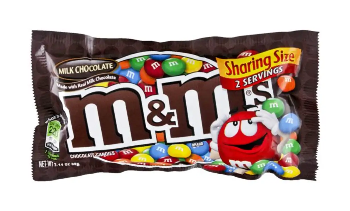 Order M & M Chocolate Candies, Milk Chocolate, Share Size - 3.14 Ounces food online from Novato Harvest Market store, Novato on bringmethat.com