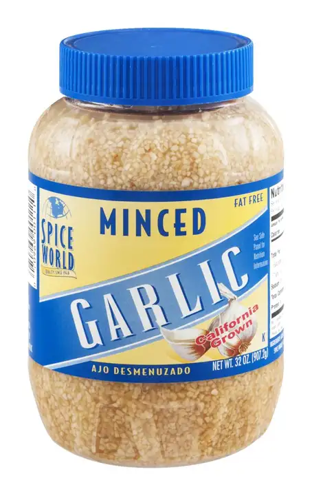 Order Spice World Garlic, Minced - 32 Ounces food online from Fligner Market store, Lorain on bringmethat.com