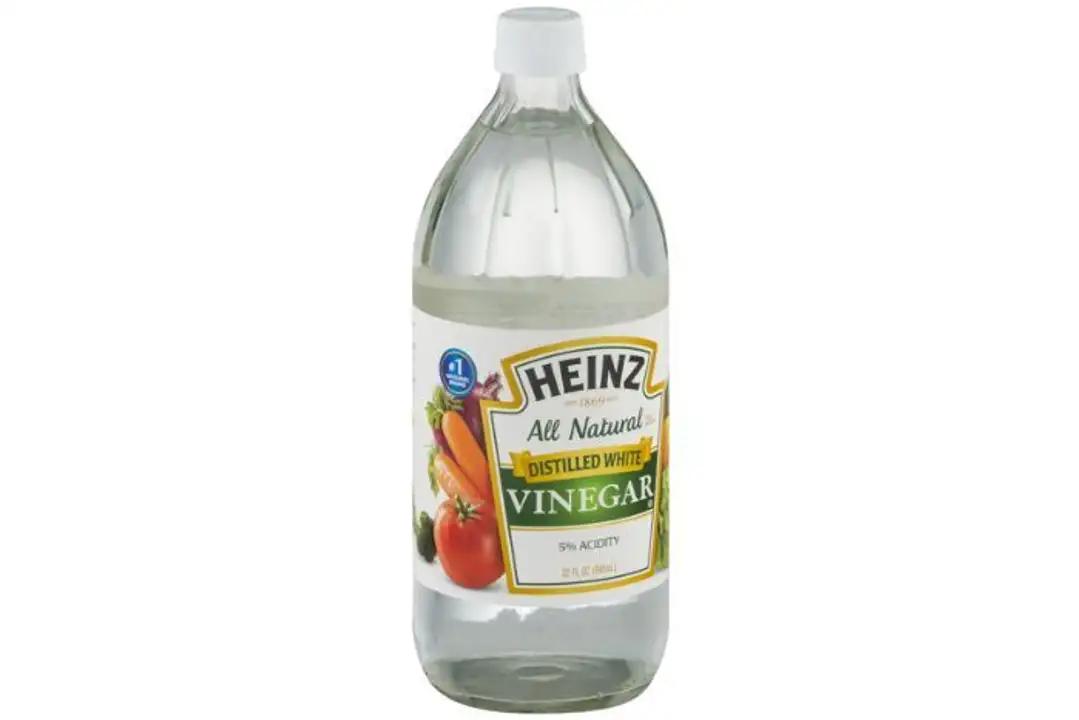 Order Heinz Vinegar, Distilled White - 32 Ounces food online from Holiday farms store, Roslyn Heights on bringmethat.com