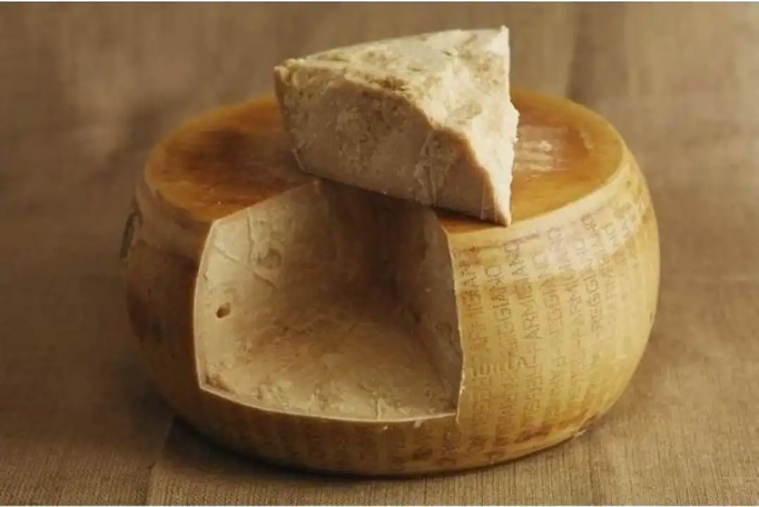 Order Parmigiano Reggiano Cheese food online from Holiday farms store, Roslyn Heights on bringmethat.com
