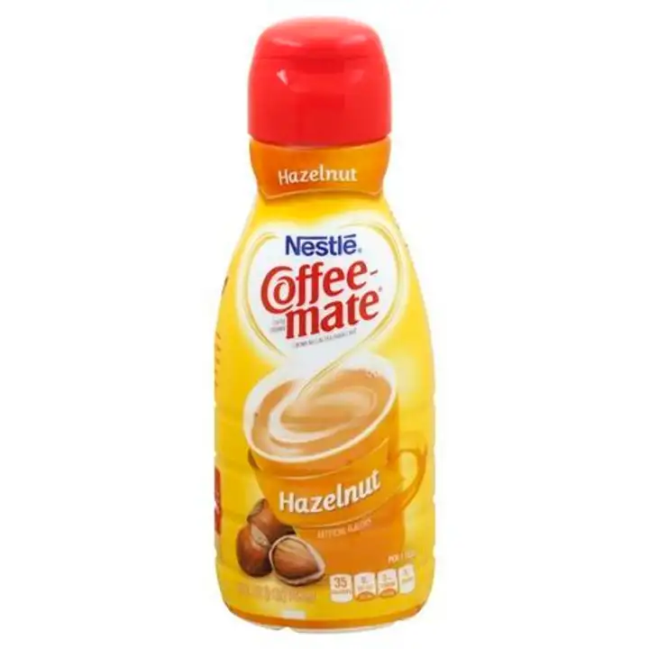 Order Coffee Mate Coffee Creamer, Hazelnut - 32 Ounces food online from Holiday farms store, Roslyn Heights on bringmethat.com