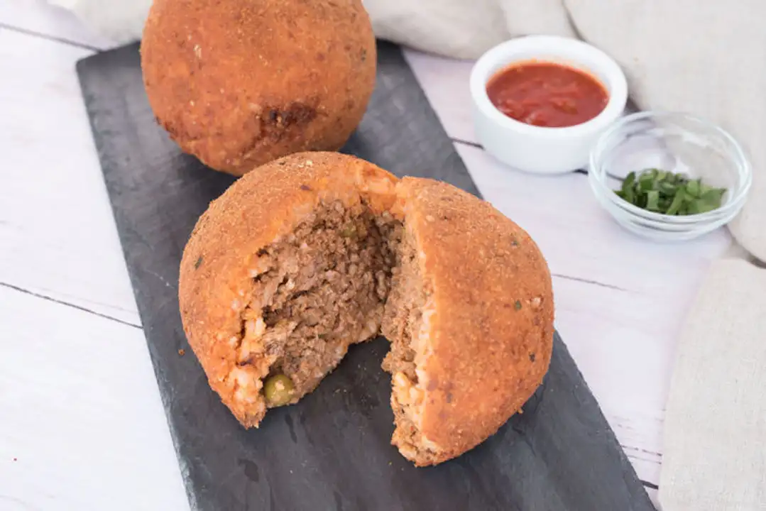 Order Large Sicilian Rice Balls  - 1 Piece food online from Meats Supreme store, Brooklyn on bringmethat.com