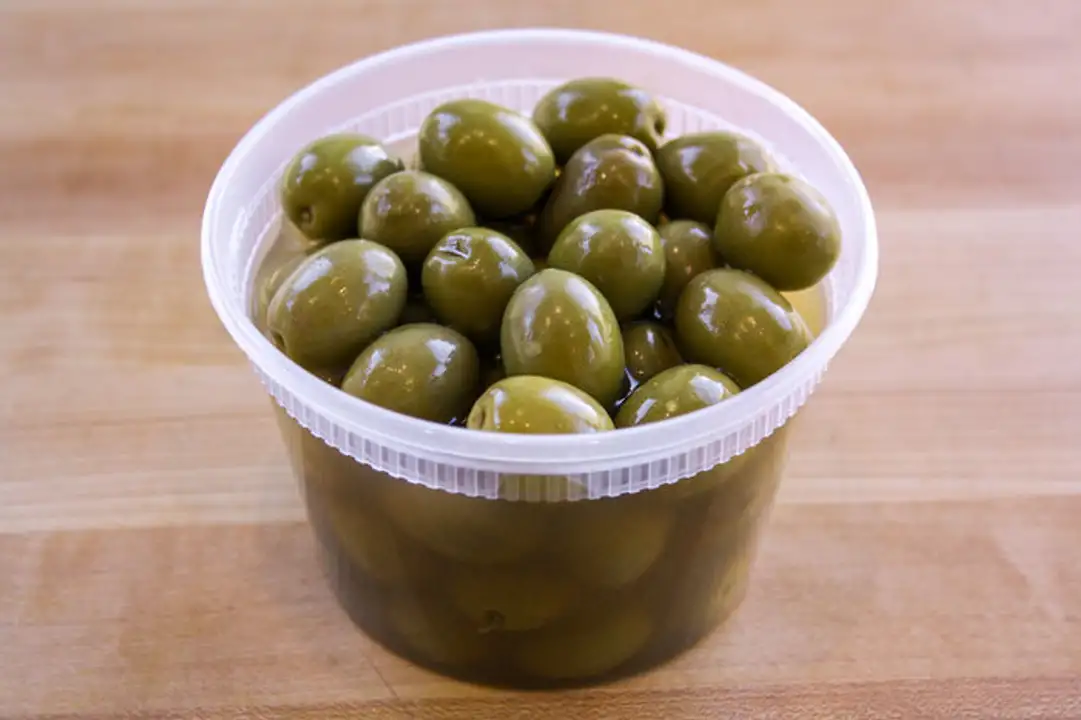 Order Whole Green Olives - 1 Pint food online from Fligner Market store, Lorain on bringmethat.com